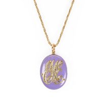 An Edwardian enamel locket pendant and chain,