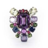 A varicoloured sapphire and amethyst clip brooch, c.1940-1950,