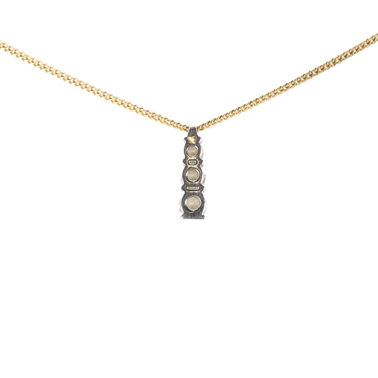 An 18ct gold diamond three stone pendant and chain, - Image 3 of 4