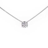 A white gold diamond solitaire pendant and chain,