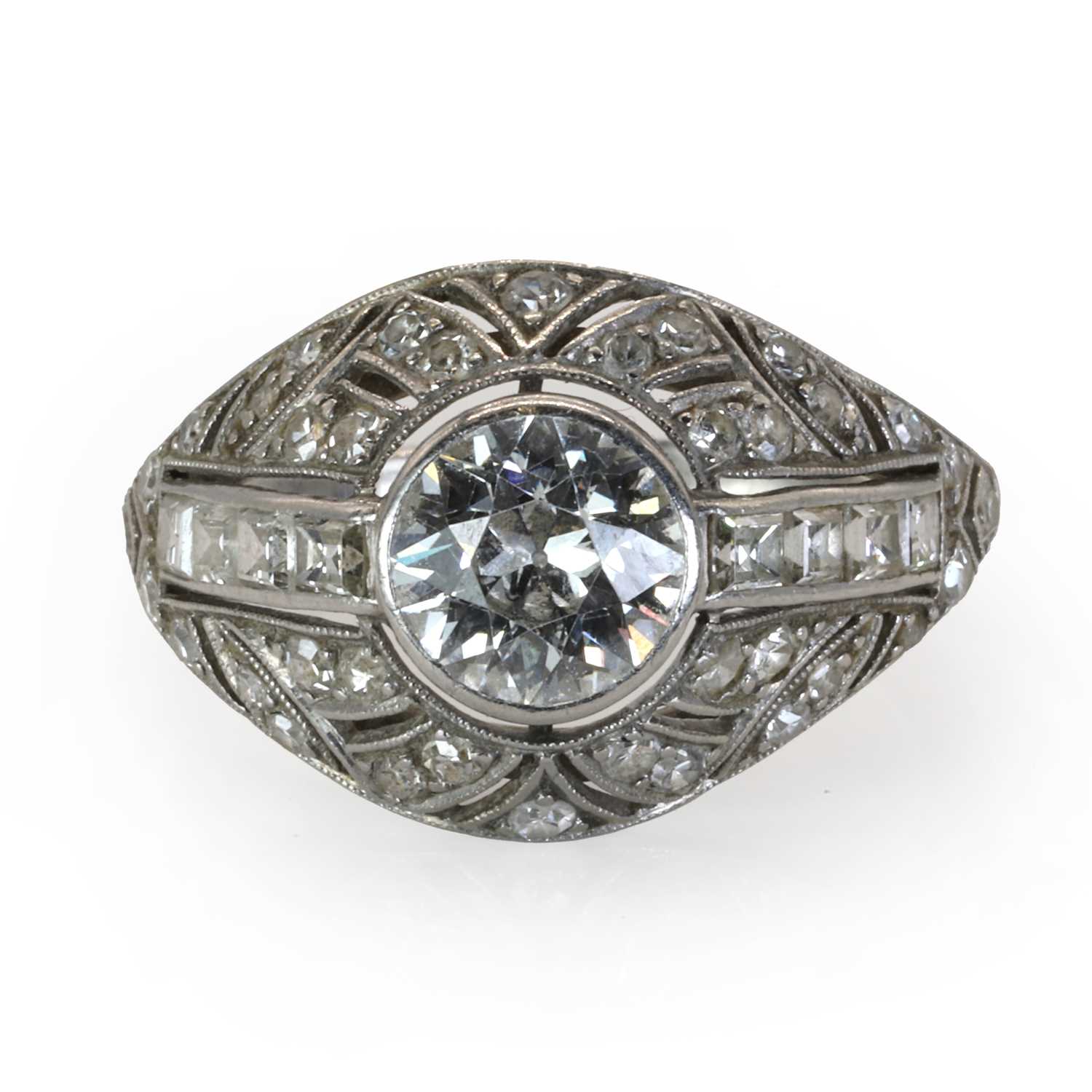 A French Art Deco platinum and diamond bombé ring, - Image 2 of 7