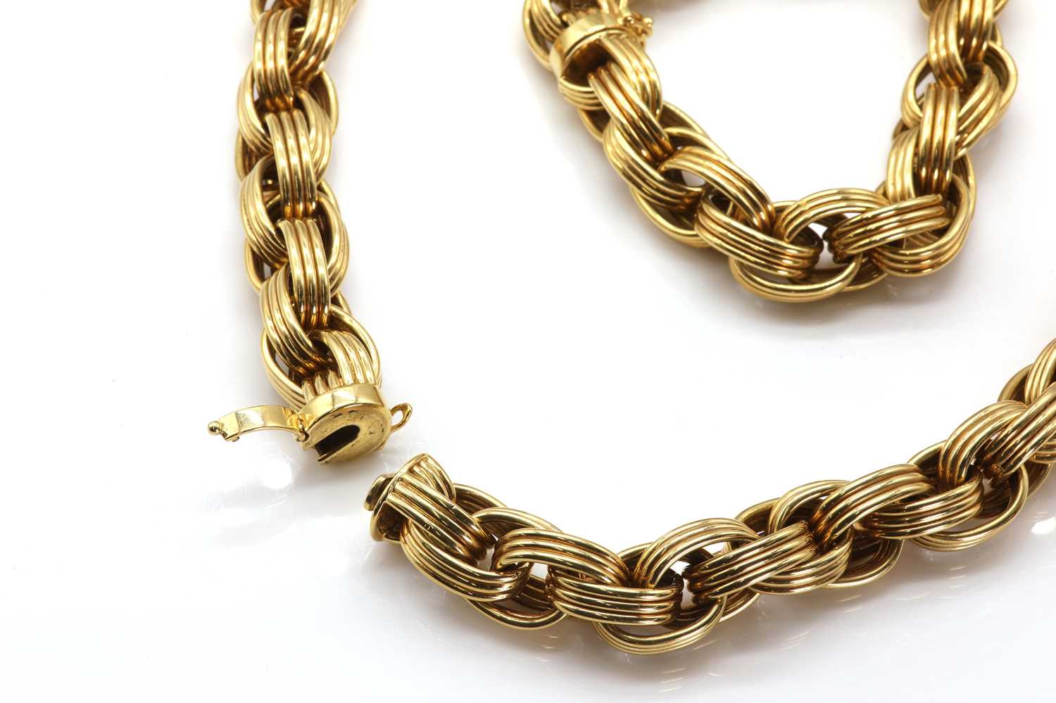 A gold oval link necklace and bracelet suite, by Tiffany & Co., - Image 3 of 4