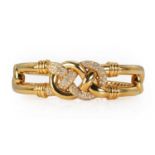An 18ct gold and diamond bangle, by Asprey,