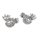 A pair of platinum and diamond spray clip earrings, c.1940,