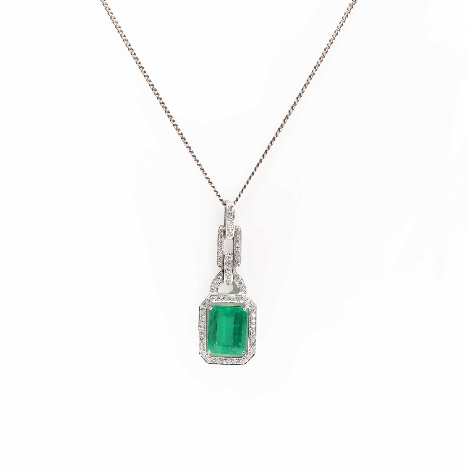 An 18ct white gold Colombian emerald and diamond pendant and chain, - Image 4 of 4