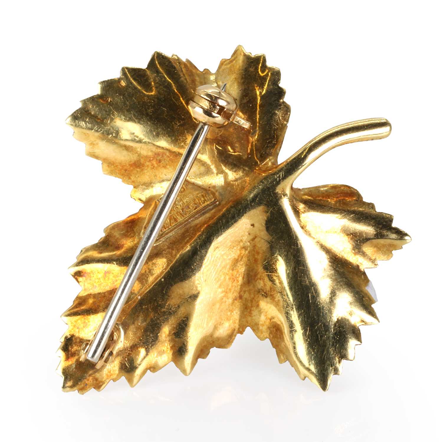 A textured gold sapphire set maple leaf pin, by Tiffany & Co., - Image 2 of 2