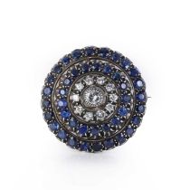 A diamond and sapphire target brooch/pendant,