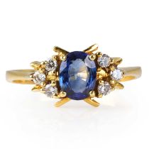 An 18ct gold cornflower blue sapphire and diamond ring,