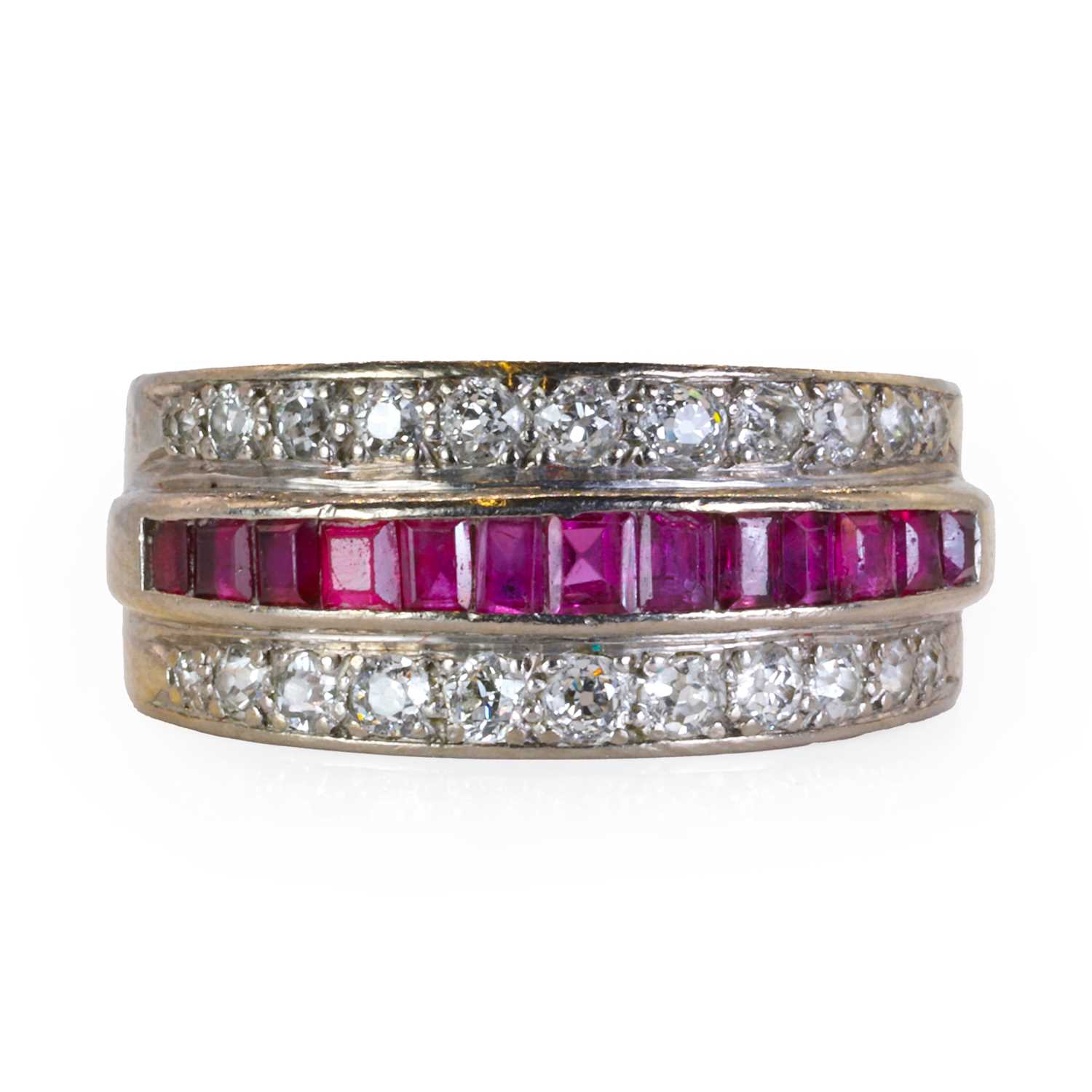 A white gold ruby and diamond three row dress ring,