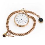 A gold Waltham pocket watch and rose gold Albert chain,