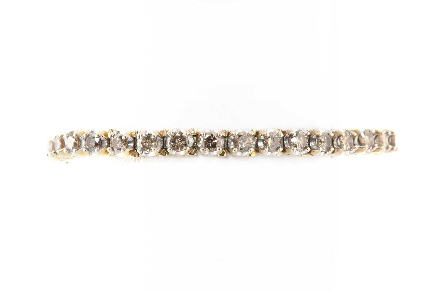 A diamond set line bracelet,