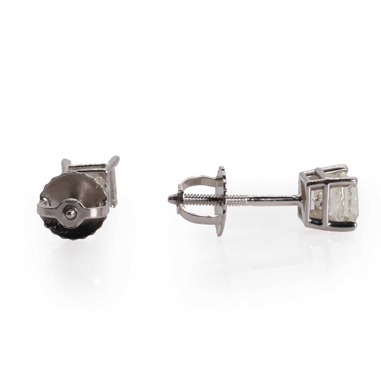 A pair of princess cut diamond stud earrings, - Image 5 of 5