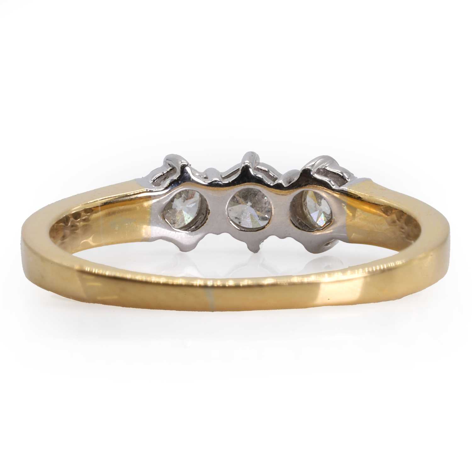 An 18ct gold three stone diamond ring, - Image 3 of 3