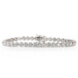 A white gold diamond line bracelet,