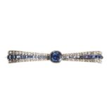 A diamond and sapphire bow brooch, c.1920,