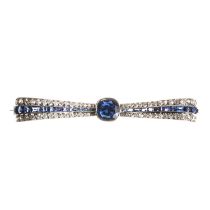 A diamond and sapphire bow brooch, c.1920,