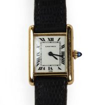 Am 18ct gold ladies' Cartier Tank mechanical strap watch,