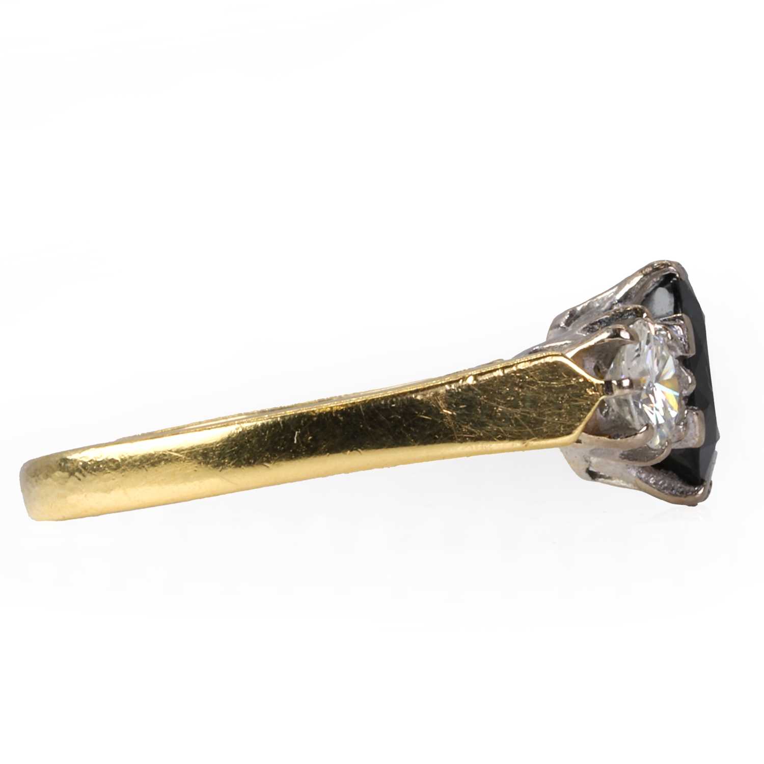 An 18ct gold diamond and sapphire three stone ring, - Image 4 of 4