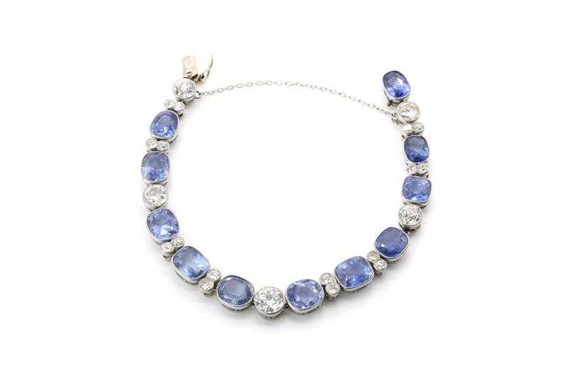 A Ceylon sapphire and diamond rivière bracelet, c.1920, - Image 3 of 3