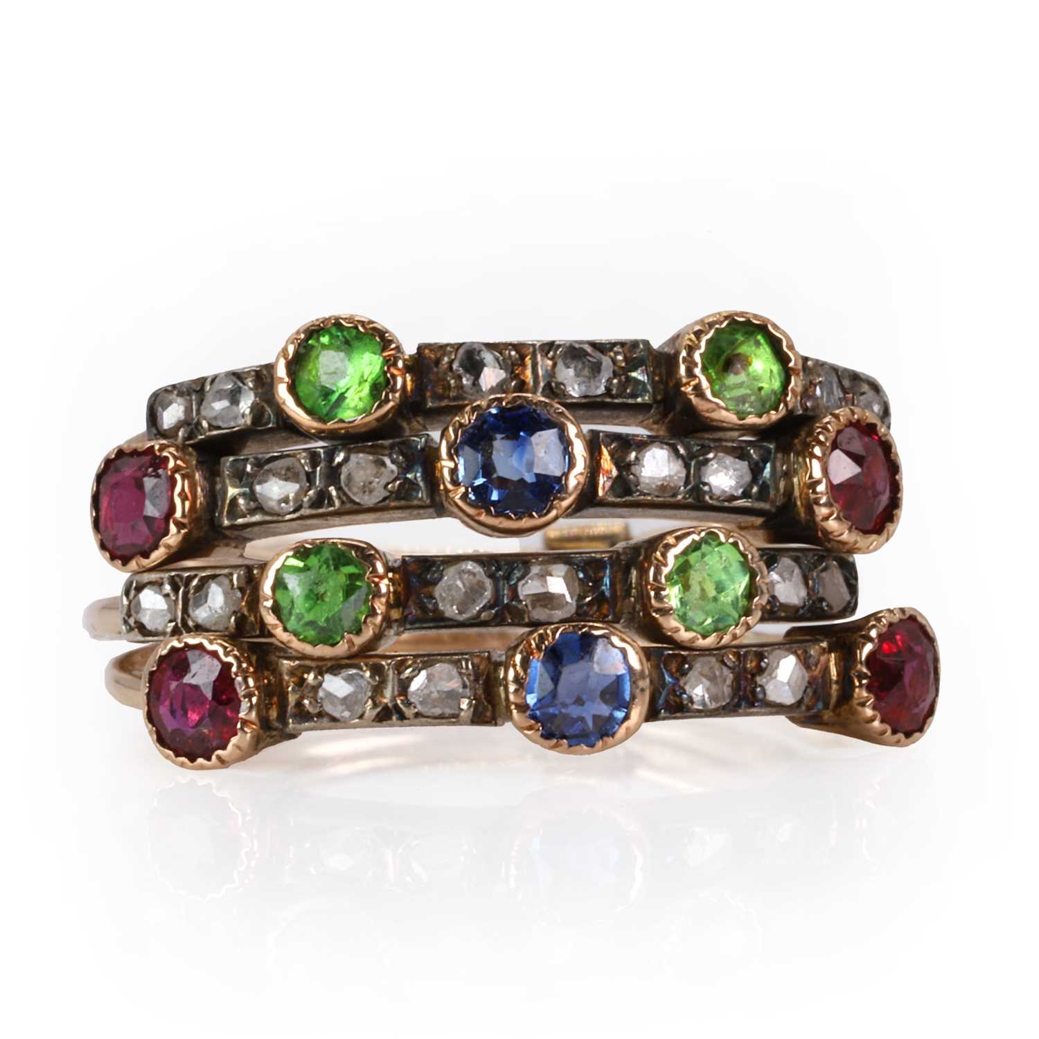 An Edwardian demantoid garnet, ruby, sapphire, and diamond Harem ring, c.1905,