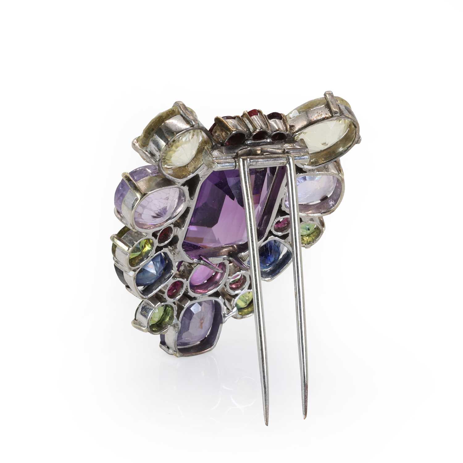 A varicoloured sapphire and amethyst clip brooch, c.1940-1950, - Image 2 of 3