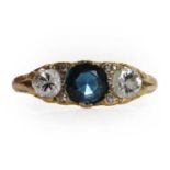 An 18ct gold sapphire and diamond three stone ring,