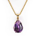 An 18ct gold amethyst pendant and chain,