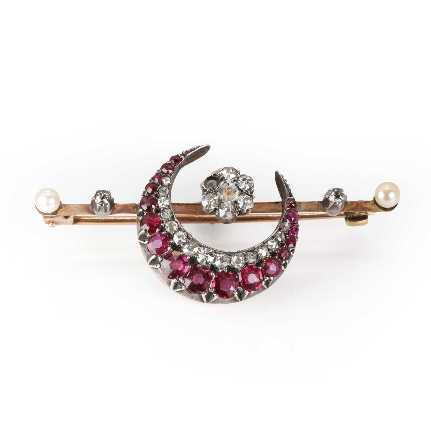 A late Victorian ruby, diamond and pearl crescent brooch,