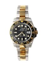 A gentlemen's stainless steel and 18ct gold Rolex GMT Master II automatic bracelet watch,