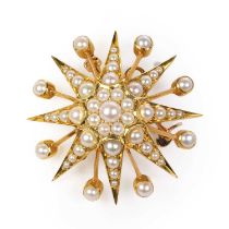 An Edwardian gold and pearl starburst brooch,