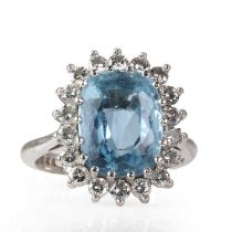 An 18ct white gold aquamarine and diamond cluster ring,