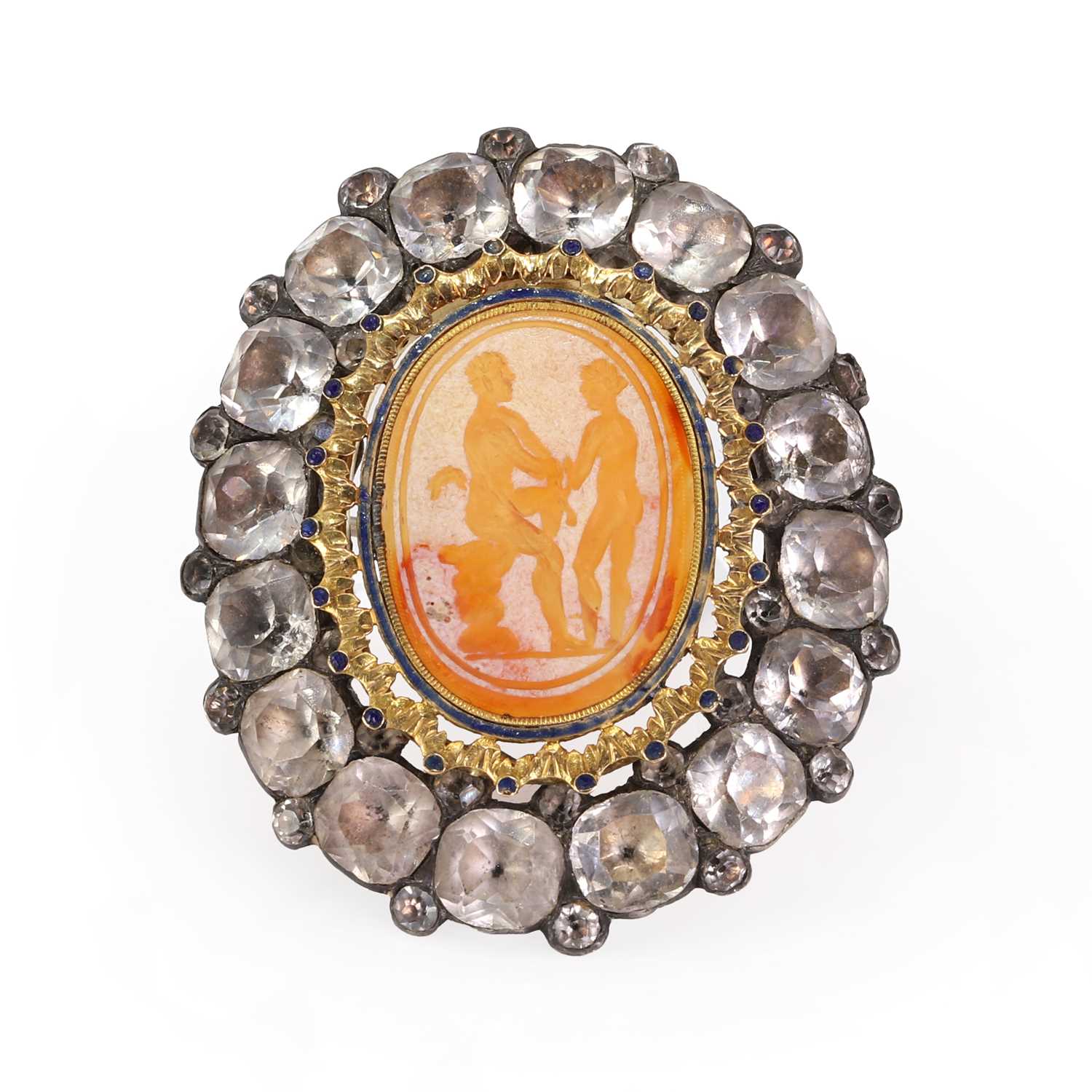 A silver mounted black dot paste and carnelian intaglio brooch,