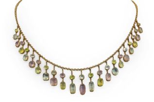 An Edwardian pink topaz, aquamarine and chrysolite fringe necklace, c.1905,