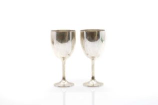 A pair of silver cups