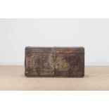 A leather-mounted pine trunk,