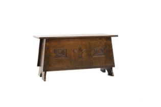 An Arts and Crafts oak coffer