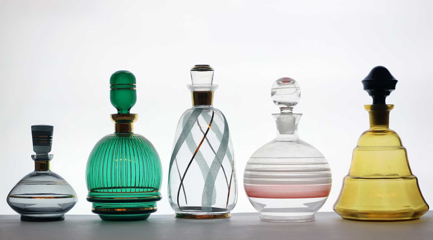 A collection of glass decanters,