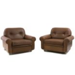 A pair of Danish leather armchairs,