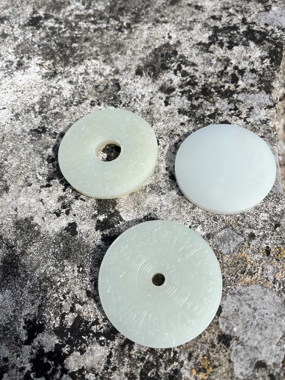 A group of three Chinese jade bi disc, - Image 22 of 29