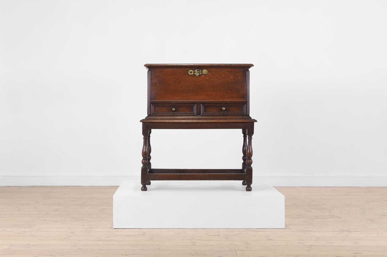 A small oak chest on stand,