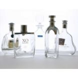 A group of five glass decanters,