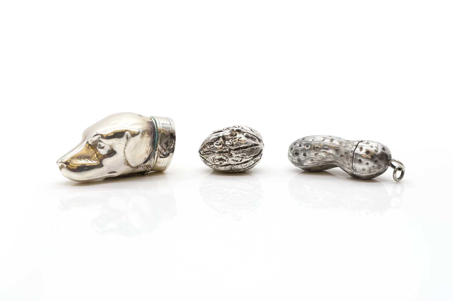 A group of three silver novelty vesta cases