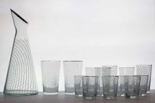 A retro suite of glass beakers and a carafe,