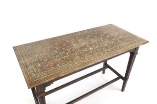 A brass inlaid side table,