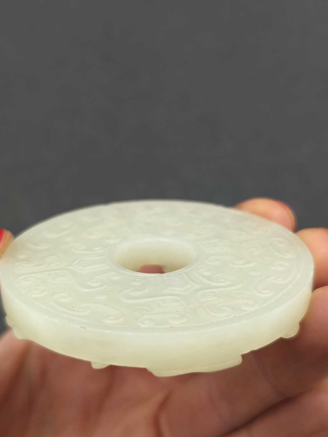 A group of three Chinese jade bi disc, - Image 18 of 29