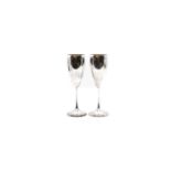 A pair of silver champagne goblets,