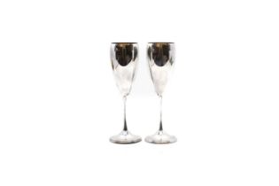 A pair of silver champagne goblets,