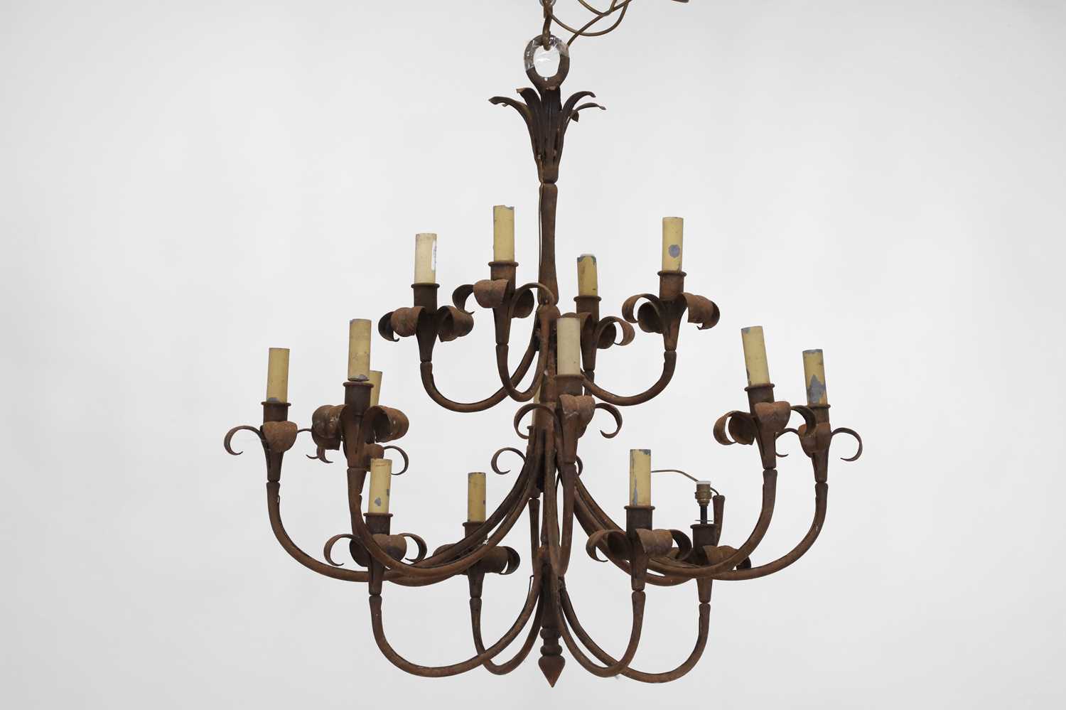 A wrought-metal sixteen-light chandelier, - Image 5 of 6