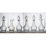 A set of four cut crystal decanters
