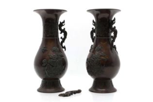 A pair of Japanese plum bronze vases,